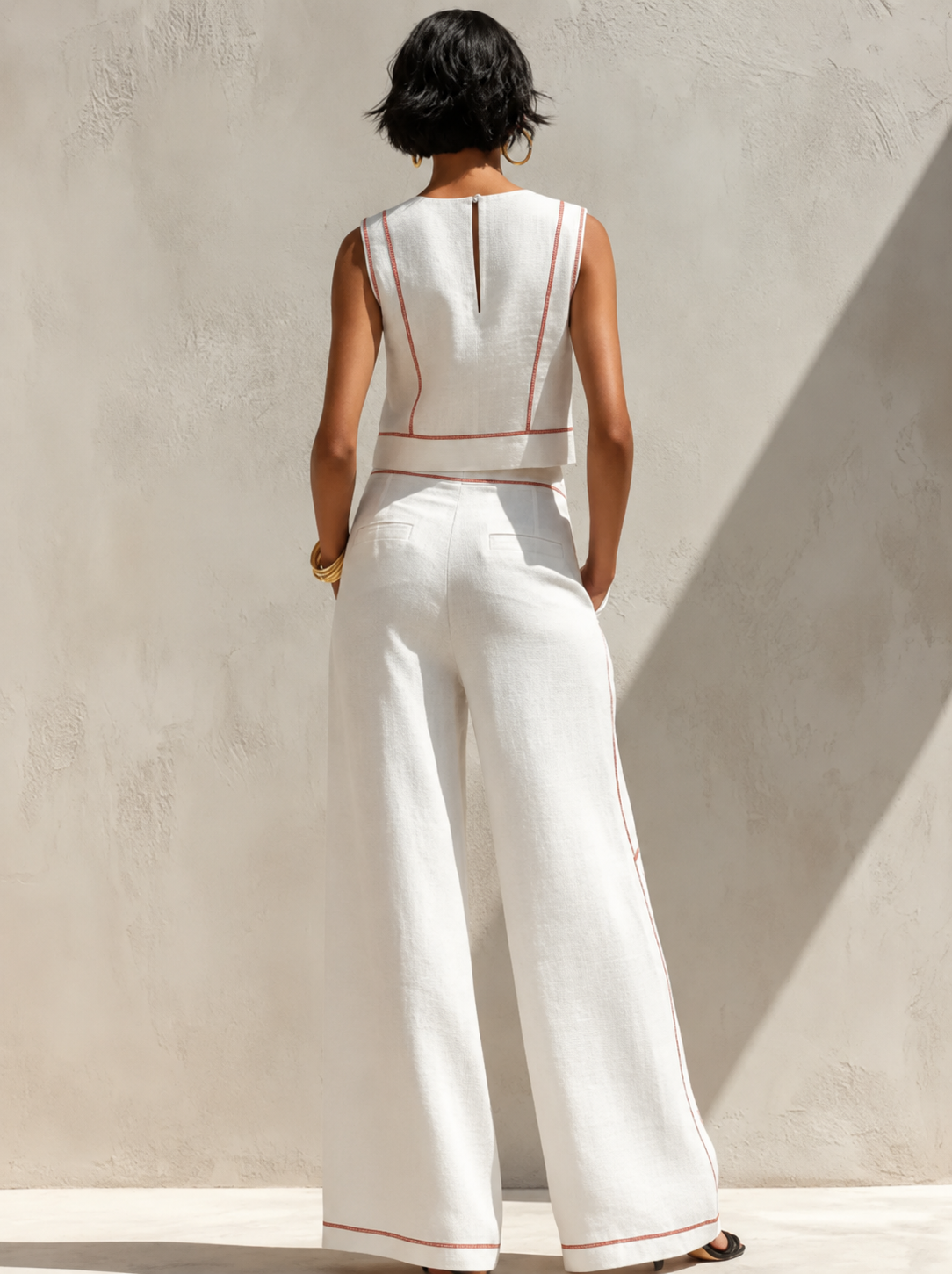 VITTORIA | Conjunto blanco con top sin mangas y pantalón de pierna ancha
