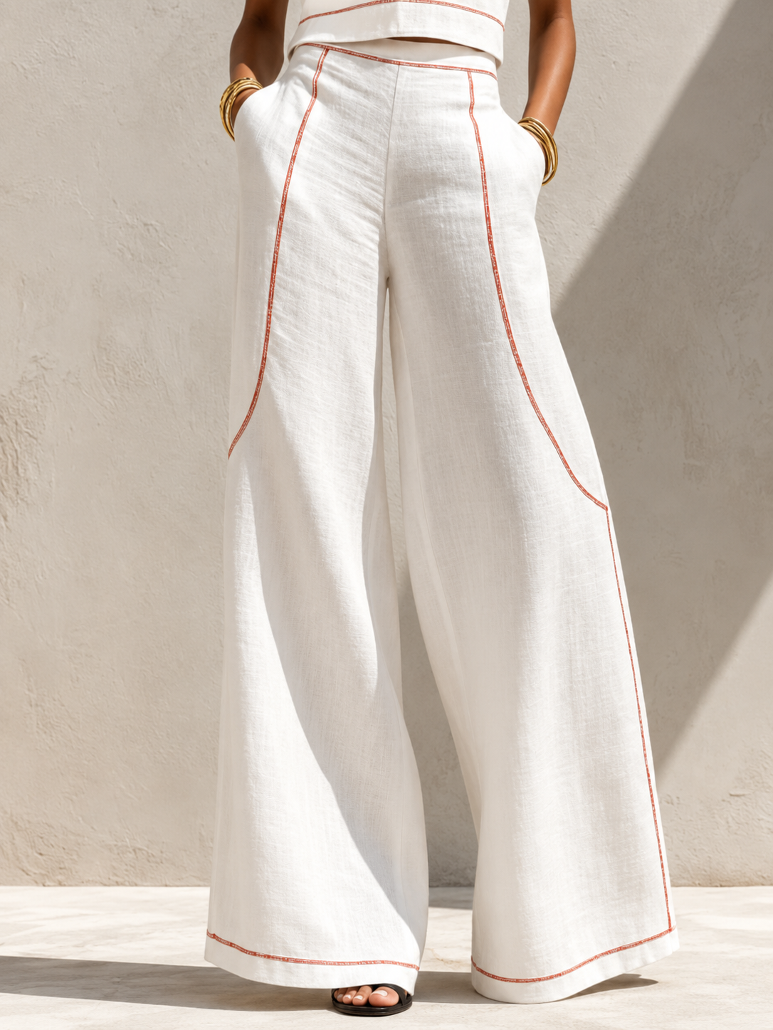 VITTORIA | Conjunto blanco con top sin mangas y pantalón de pierna ancha