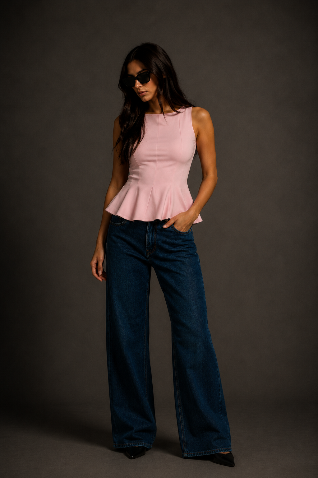 Top peplum sin mangas elegante