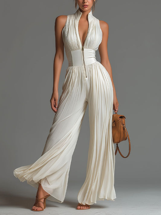 Mono de chiffon blanco sin mangas con escote en V, cremallera y pantalón de pierna ancha plisado