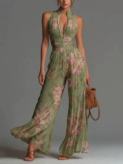 Mono de chiffon blanco sin mangas con escote en V, cremallera y pantalón de pierna ancha plisado