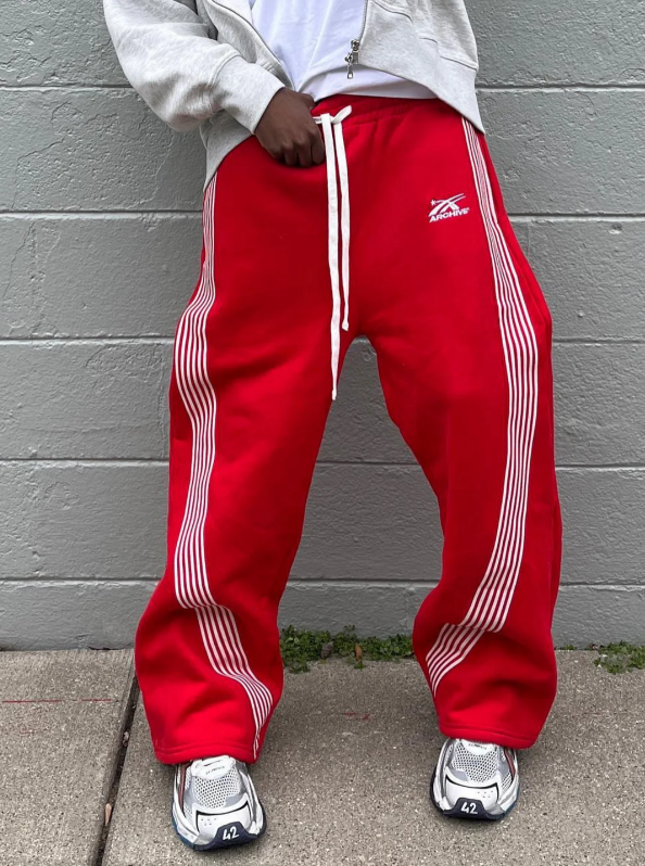 Pantalón Track Nova Drip – Jogger Wide Leg con Rayas Laterales